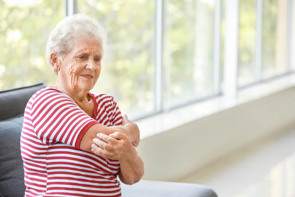 What does rheumatoid arthritis in the elbow feel like? shutterstock 1507493300 elbow arthritis