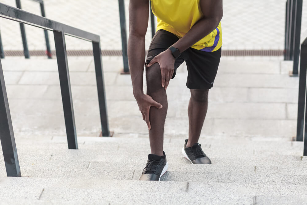 Three factors leading to knee pain when walking up stairs shutterstock 1086955133 knee pain walking up stairs