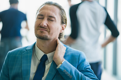 What to do about neck pain when looking up shutterstock 1888887016 neck pain when looking up