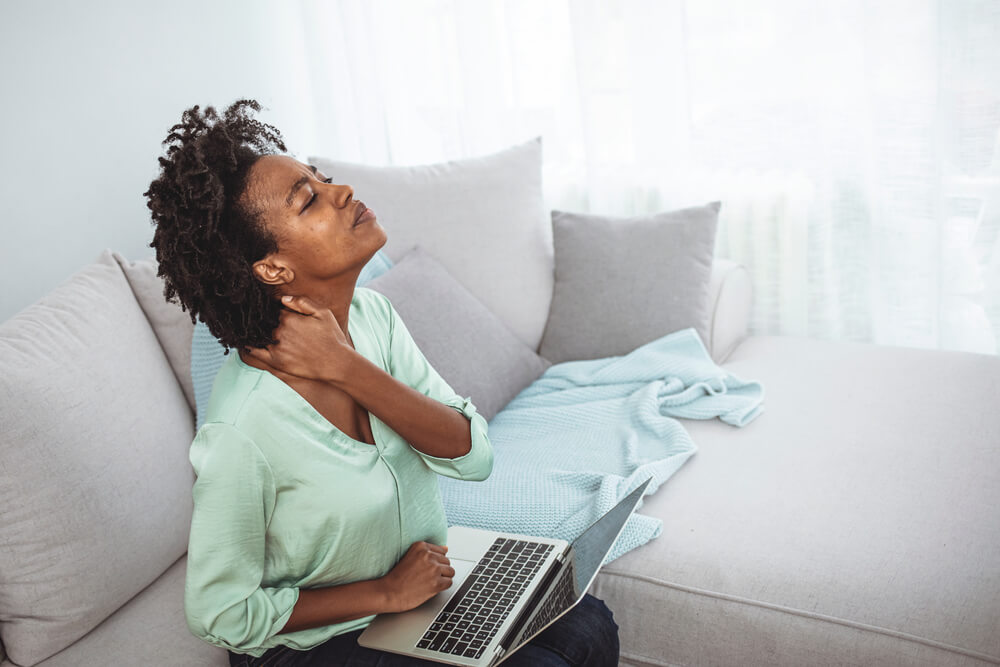 How long does a stiff neck last? shutterstock 1937448745 how long does a stiff neck last?