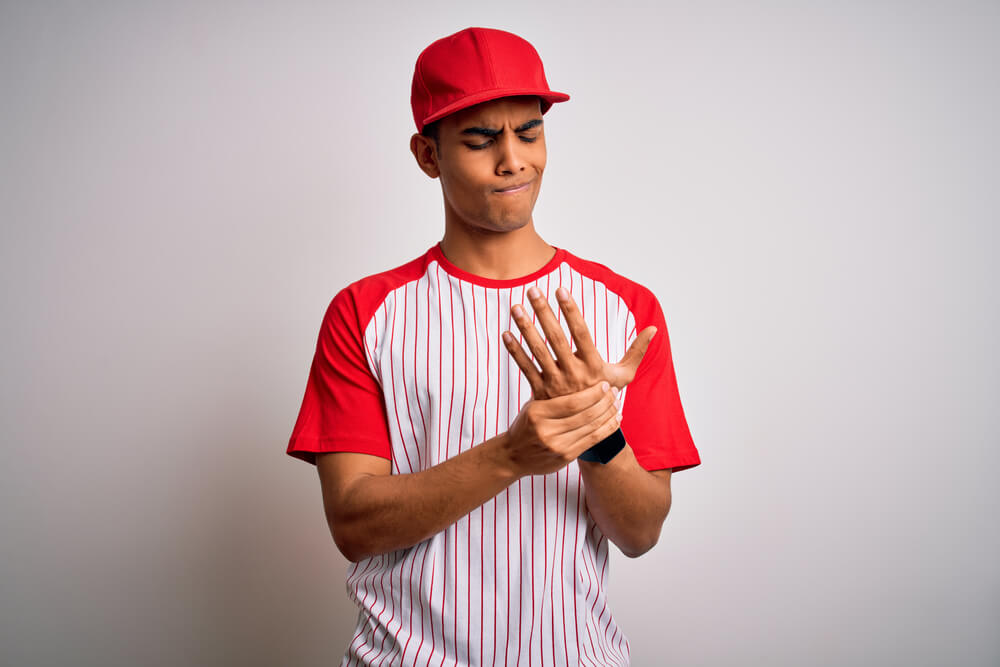 Discover the top 4 baseball-related hand injuries shutterstock 1664218606 baseball hand injuries