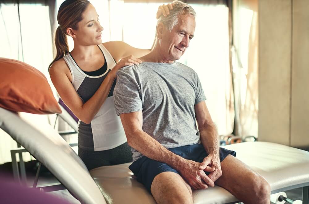 4 tips that can make living with degenerative disc disease in the neck easier in just minutes a day shutterstock 2167788743 living with degenerative disc disease in the neck
