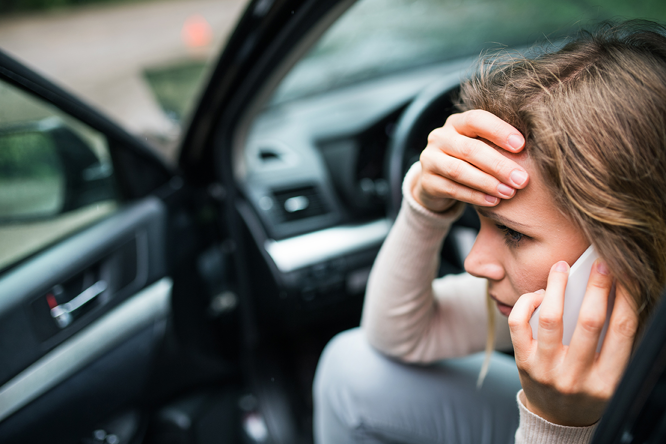 Hip pain after a car accident: Why you have it and what to do about it young woman in the damaged car after a car acciden 2021 08 26 12 09 10 utc 1 Hip pain after a car accident: Why you have it and what to do about it