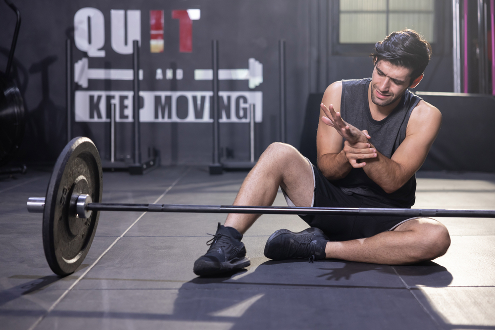 5 weight lifting issues that could be behind your wrist pain shutterstock 1955353897 wrist pain from lifting