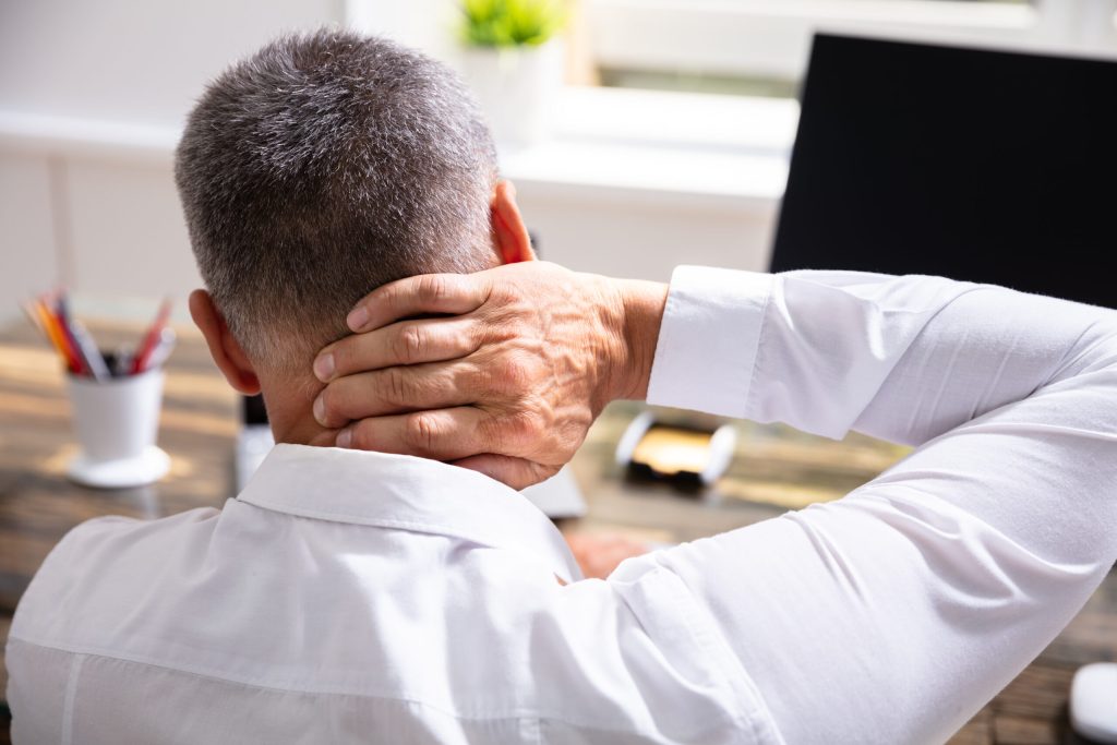 Should I Use Ice or Heat for a Stiff Neck? AdobeStock 286938671 scaled 1 should i use ice or heat for a stiff neck?