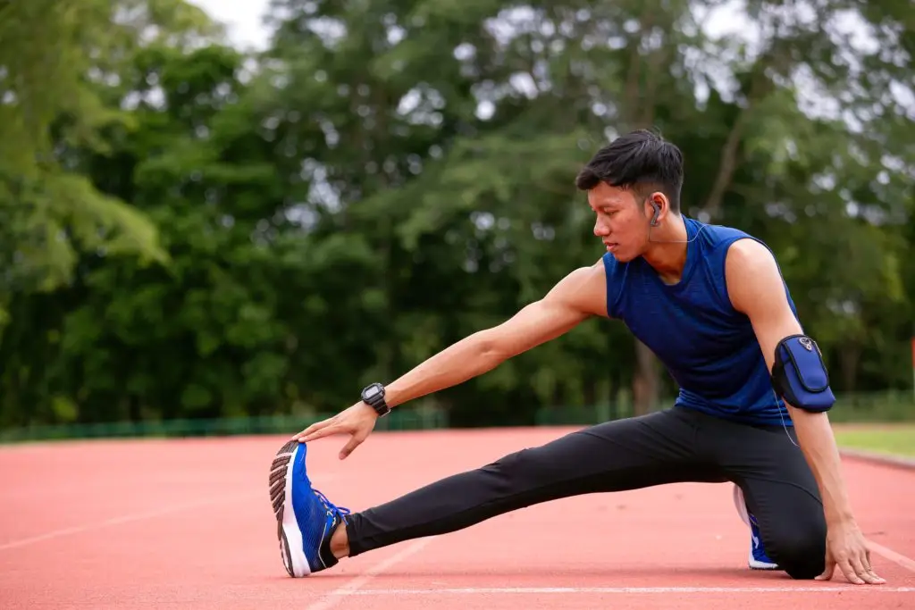 Holistic Post-Run Stretching Routine AdobeStock 1063618961 scaled 1 holistic post-run stretching routine injury prevention