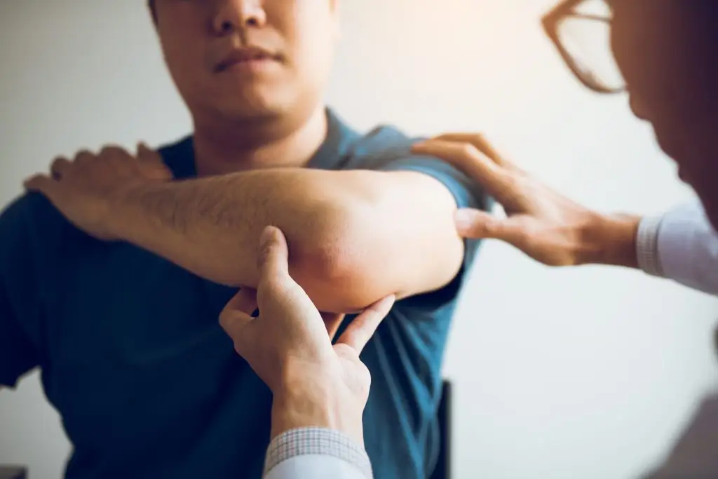 Funny Bone Pain: Cubital Tunnel Syndrome AdobeStock 266232095 scaled 1 funny bone pain: cubital tunnel syndrome elbow pain